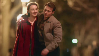 Brooklyn is the story of Irish girl Eilis (played by Saoirse Ronan) who comes to America and is swept away by a Brooklyn boy (played by Emory Cohen).